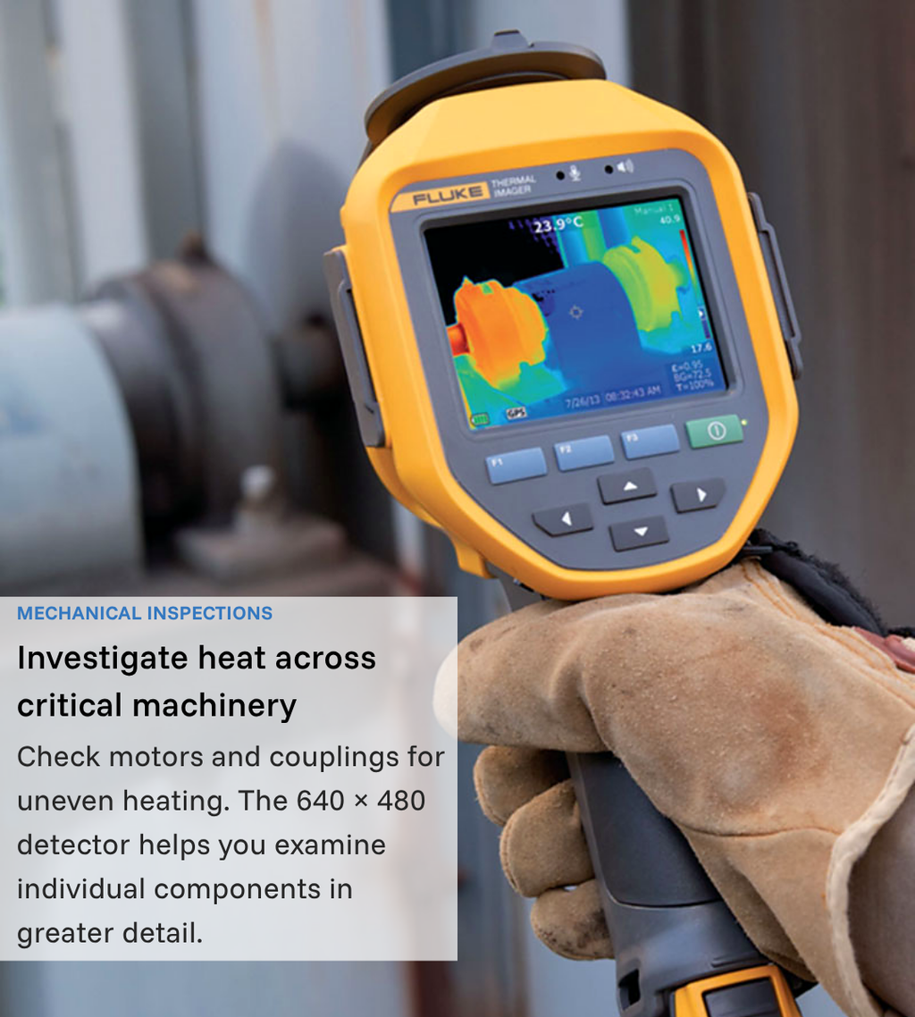 Gloved hand holding a Fluke thermal camera beside industrial machinery; annotation describes checking motors and couplings for uneven heating.