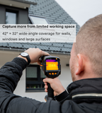Building surveyor inspecting a house with a Testo 883-2 wide-angle thermal camera