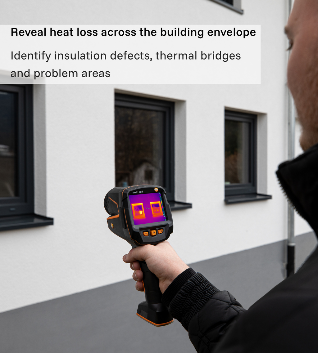 Testo 883-2 thermal camera inspecting heat loss across a building façade