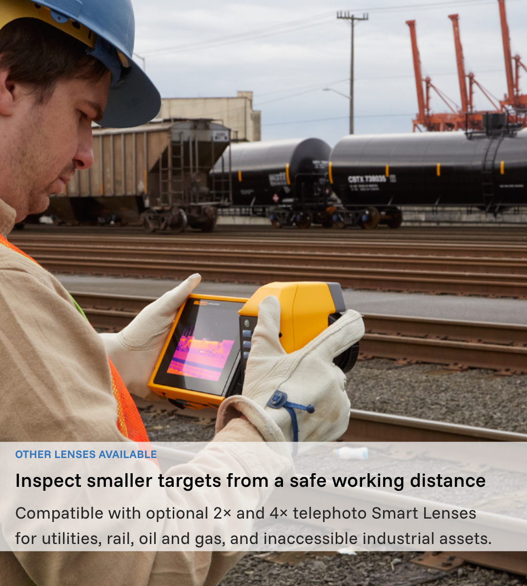 Technician using a Fluke TiX501 thermal camera to inspect railway assets from a distance